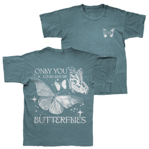 JVKE blue comfort colors t-shirt with butterfly graphic and INK on the front. The back features large butterflies, white text ONLY YOU COULD GIVE ME BUTTERFLIES, stars, and sparkles—ideal for unique style fans.