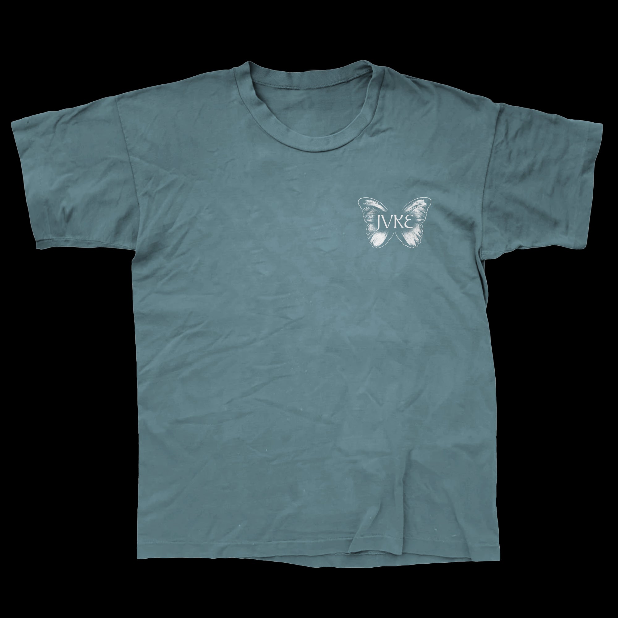 A plain teal JVKE Comfort Colors T-shirt with a small white butterfly graphic on the left chest, featuring JVKE letters inside the butterfly for a simple, stylish look.
