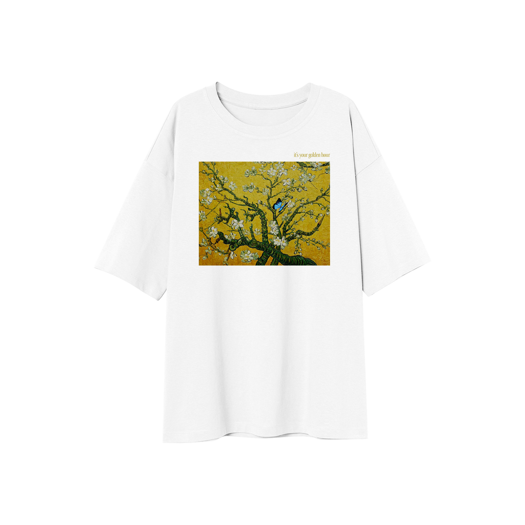 image of the front of a white tee shirt on a transparent background. tee is oversized and has a full center chest print of a golden yellow rectangle with a tree with white flowers and a blue bird.